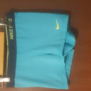 Blue Nike pro shorts
